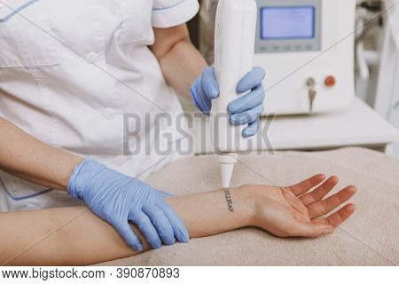 Cropped Shot Of Unrecognizable Woman Getting Tattoo Removed By Laser At Beauty Salon. Professional D