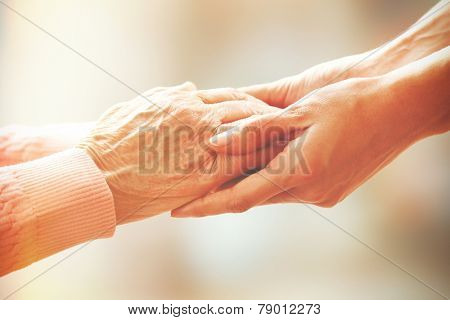 Helping hands, care for the elderly concept