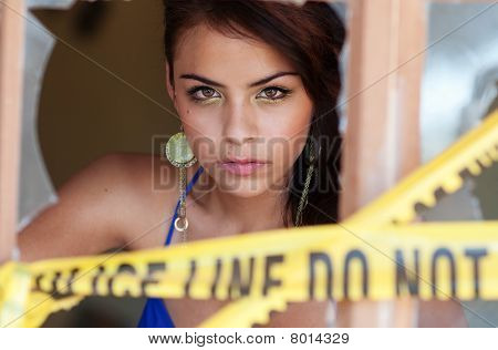 Pretty woman behind crime scene