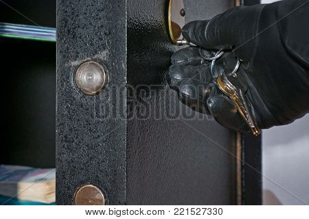 Detail of Open Safe with Hand of Thief