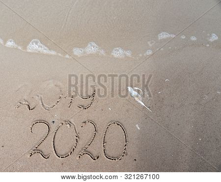 New Years 2020 Replace 2019 Concept. End Of 2019 Happy New Year 2020, Lettering On Beach With Wave A