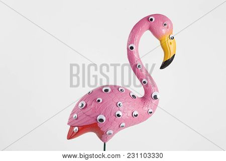 Quirky And Freak Pink Plastic Flamingo On A Pink Background With Numerous Eyes
Gradient And Tones On