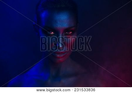 Female Art Portrait. Beautiful Sexy Young Woman With Glamorous Mystical Makeup In Nightclub. Beautif