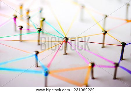 Linking entities. Networking, social media, SNS, internet communication abstract. devices or people connected to a network. Colorful Web of green, blue, red and blue purple wires on white background.