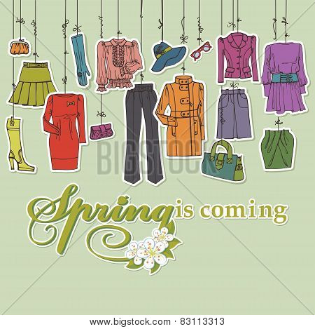 Womans clothing and accessories hanging on ropes.Spring