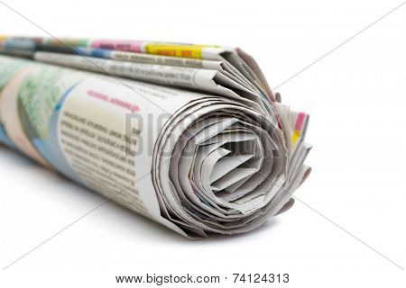 Roll of newspapers, isolated on white background