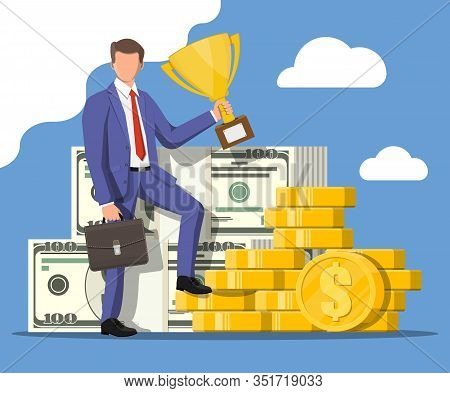 Successful Businessman With Dollar And Coins Holding Trophy, Celebrates His Victory. Business Succes