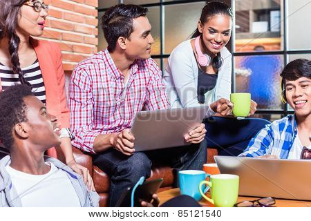 Group of diversity college students learning on campus, Indian, black, and Indonesian people