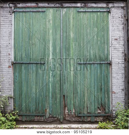 Large Old Barn Doors With Peeling Green Paint