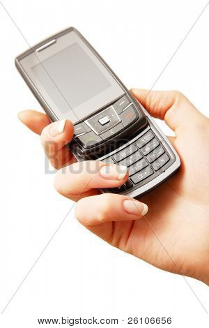 Telefono cellulare in mano di donna. Isolated on white. Closeup.