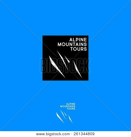 Alpine Mountains Tours Logo. Mountain Travel Agency Emblem. Lighting Mountain Peaks And Letters On B