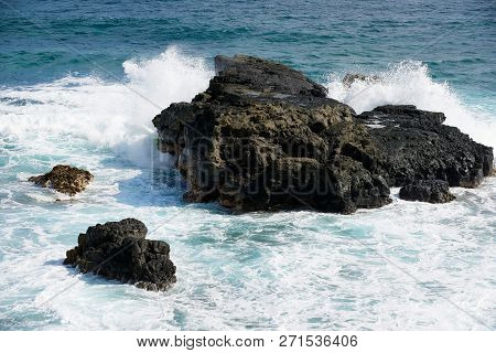 Wave Breaking Down To Splashes At The Shore Rocks At Gris-gris, Mauritius Island.