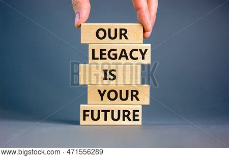 Legacy And Future Symbol. Concept Words Our Legacy Is Your Future On Wooden Blocks. Beautiful Grey T