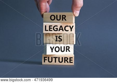 Legacy And Future Symbol. Concept Words Our Legacy Is Your Future On Wooden Blocks. Beautiful Grey T