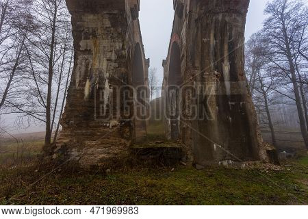 Old Concrete Railway Bridge In Stanczyki. Foggy Morning. Mazury, Poland