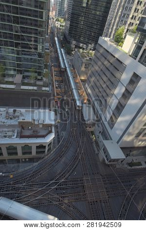 Looking Down On A Chicago Commuter Subway Trains In The Downtown Loop Business District Two Passing 