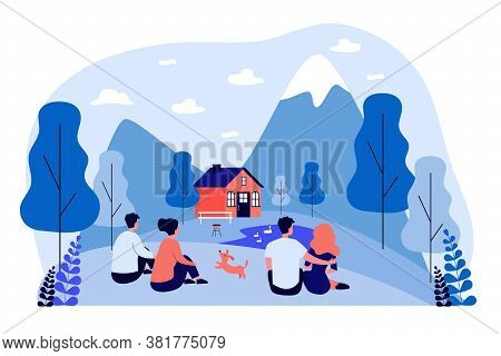 Dating Couples Admiring Landscape In Mountains. Back View Of Men And Women Sitting On Ground Outdoor