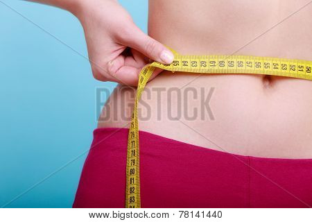 Diet. Fitness Woman Fit Girl With Measure Tape Measuring Her Waist