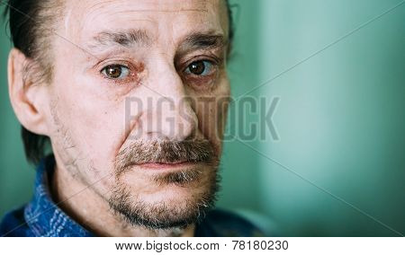 Portrait Of Serious Sad Old Adult Expressive Man With Beard Looking At Camera