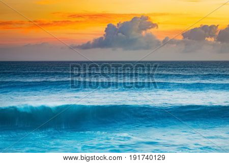 Big wave of Indian ocean at sunset. Gris Gris Beach. Mauritius