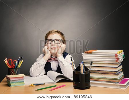 School Child Boy In Glasses Think In Classroom, Kid Primary Students Reading Book