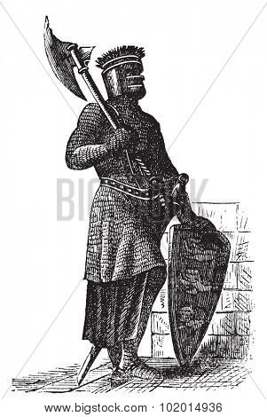 Armor and weapons during the first Crusades era, old engraving. Vector, engraved illustration of Crusade knight, in mail armor, with hauberk, shield and sword.