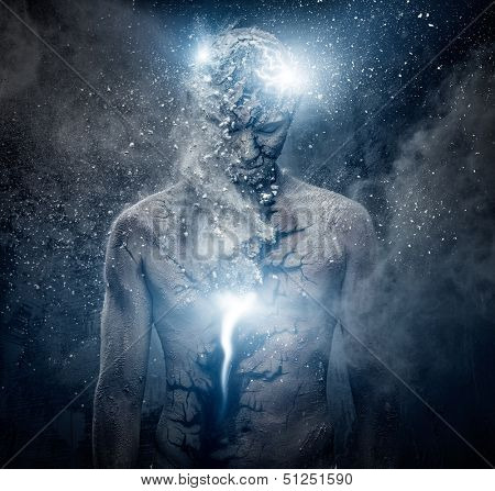 Man with conceptual spiritual body art