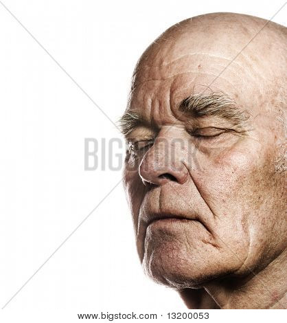 Elderly man's face over white background