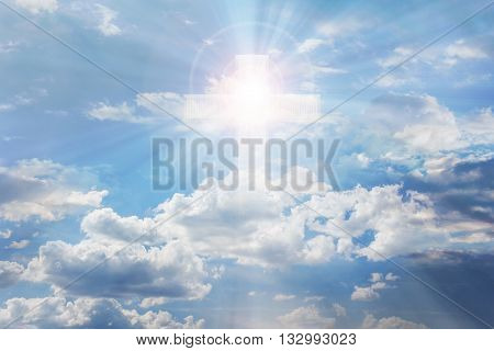 Light From Sky Or Heaven Shine Trough Crucifix Or Cross Form On Pure White Shining Puffy Clouds Sky,