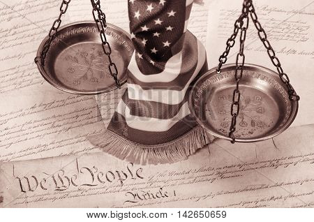 Scales of justice American flag and US Constitution