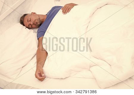 Healthy Habits. Man Handsome Guy Lay In Bed Sleeping. Get Enough Amount Of Sleep. Tips Sleeping Bett