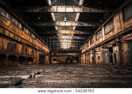 Abandoned industrial interior with bright light