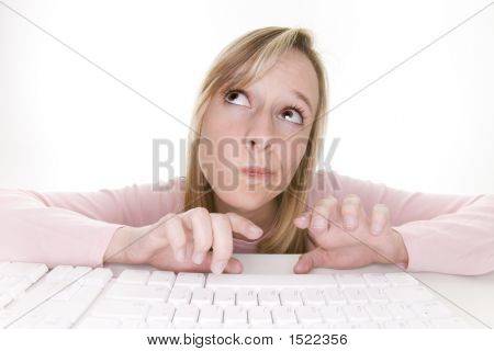 Teenage Girl Thinking Using Computer