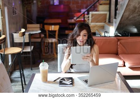 Business Selling Online, Young Asian Woman In Casual Dress Working On Tablet And Computer For E-busi