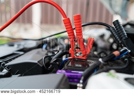 Car Battery Jump Cable For Car Battery Is Dead. Car Battery Charger The Car Battery Is Exhausted. Ca