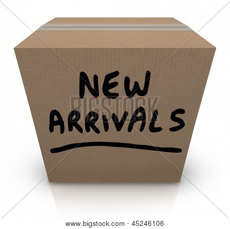 The words New Arrivals written on a cardboard box full of the latest and newest products and merchandise delivered to the store, the seller, or to you, the buyer