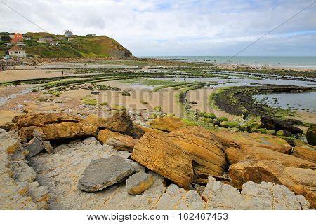 Cap Gris Nez in Cote d'Opale, Pas-de-Calais, France: View from the beach with colorful rocks