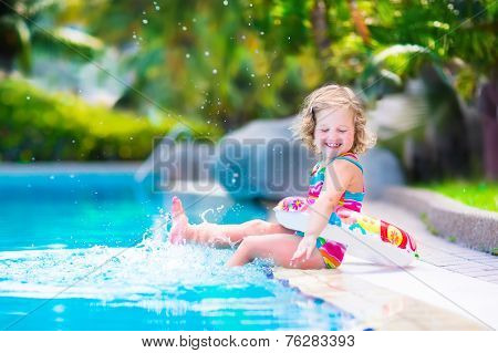 Little Girl In A Swimming Pool