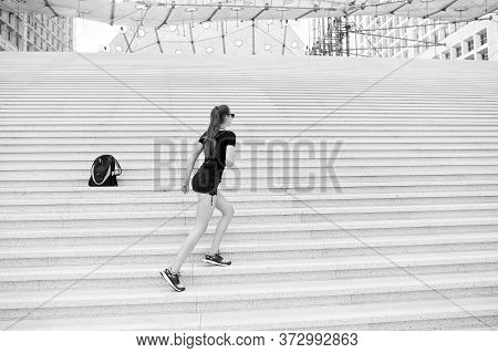 Kick Feet Up And Go. Energetic Woman Climb Stairs Outdoors. Active Life. Freedom From Care. Free And