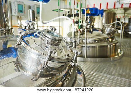 factory with pharmaceutical equipment mixing tank on production line in pharmacy industry manufacture factory