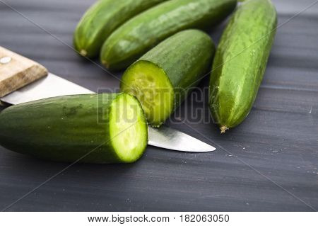 Cucumber, organic natural sailor cucumber pictures, cutting a cucumber with a knife, cucumber pictures on different topics