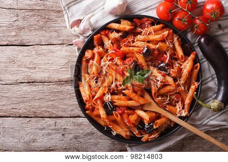 Italian Pasta Alla Norma Close-up And Ingredients. Horizontal Top View