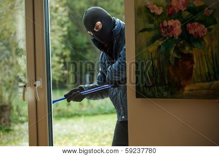 Burglar Behind Window