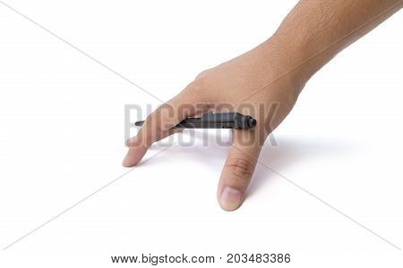 Hand writing on copy space. Male hand holding black pen isolated on white background