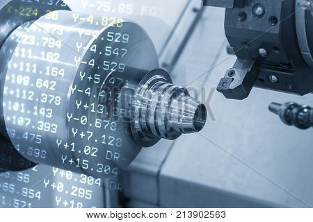 The abstract scene of CNC lathe machine with the NC data background The Turning machine cutting the metal cone shape part .Hi-precision CNC machining concept.