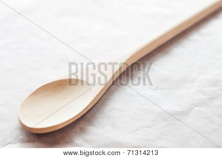 Wooden Spoon On Baking Paper