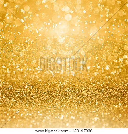 Abstract glamorous gold glitter sparkle confetti background or glitzy glam luxury golden color party invitation for birthday anniversary wedding Christmas or new year's eve