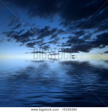 Dark dramatic clouds over water