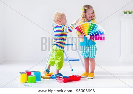 Children Painting Walls At Home Remodel