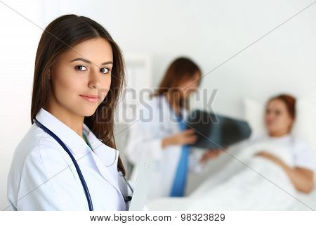 Beautiful Female Medicine Doctor Looking In Camera